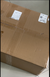 Sealed carton prepared for digital night vision international shipping